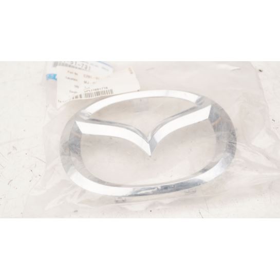 Embleman w przedni zderzak Mazda 5 nowy oryginał