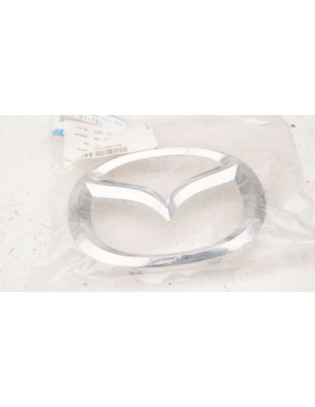 Embleman w przedni zderzak Mazda 5 nowy oryginał